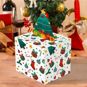 Detail of Christmas candy box featuring 3D tree topper and colorful holiday patterns
