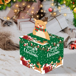 Green Christmas candy gift box with reindeer topper and festive Merry Christmas print