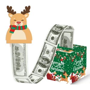 Detail view of Christmas money pull gift box with Santa motif and reindeer card topper