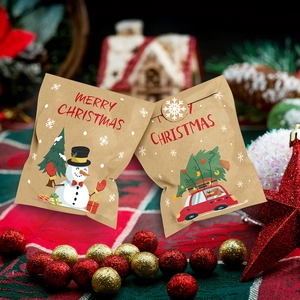 Christmas kraft paper gift bags with snowman and red car prints in a festive holiday setting