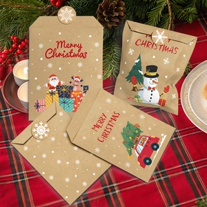 Detail of kraft paper Christmas envelopes with Merry Christmas prints and stickers