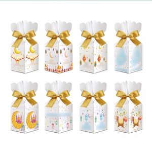 Set of eight Eid Ramadan gift boxes featuring moon and castle patterns with gold ribbons