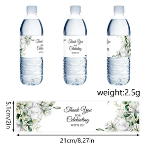 Detailed view of floral water bottle labels with dimensions 5.1x21cm for wedding decor