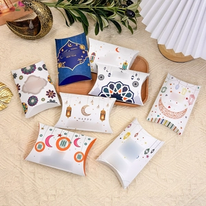 Detail of moon pattern pillow gift boxes for Eid and weddings on a wooden tray