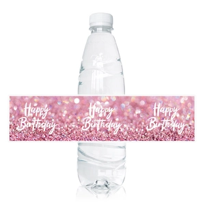 Pink glitter Happy Birthday bottle label sticker shown wrapped on a water bottle