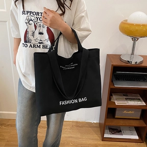 Retro black canvas tote bag with fashion typography for student daily school and commute