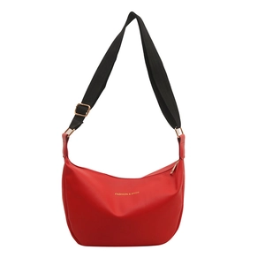 Red PU leather hobo bag with adjustable black fabric strap and gold fashion lettering
