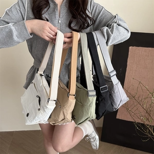 Minimalist lightweight nylon crossbody bags for women in five assorted neutral colors