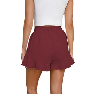 Rear view of wine red cotton linen shorts with ruffled hem and elastic waist details