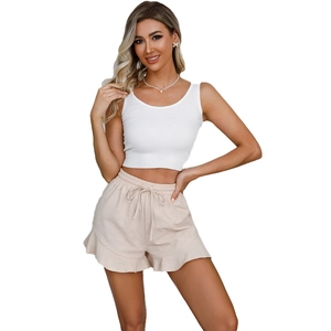 Women's summer cotton linen lounge set with ruffle hem shorts and white ribbed crop top