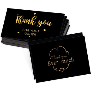 Minimalist black and gold thank you card set with premium foil lettering and hearts
