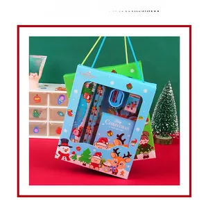 Detailed Christmas stationery gift box for kids including notebook and pencil set