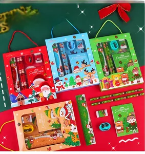 Close-up of Christmas stationery set with pencils, ruler, and eraser in festive gift box