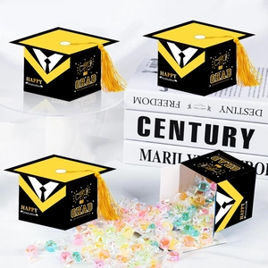Square graduation cap candy boxes with yellow tassels and Happy Graduation prints