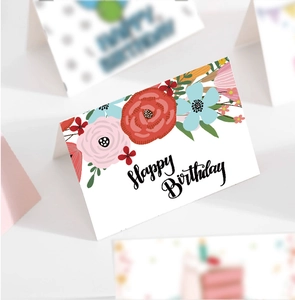 Detailed view of floral Happy Birthday card with colorful flowers and elegant typography