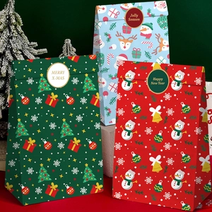 Three-color Christmas paper gift bags with Santa and reindeer prints for holiday packaging