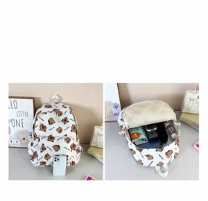 Detailed view of the large capacity interior of the white Capybara cartoon backpack