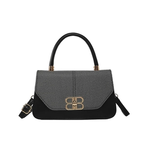 Minimalist black and grey shoulder bag with golden double-B buckle on white background
