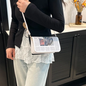 Minimalist white newspaper print crossbody bag with chain strap for women