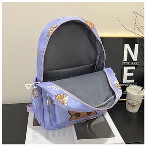 Detail showing the inner compartments and dual storage space of the light purple backpack