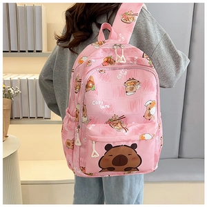 Detailed view of pink backpack with cute Capybara cartoon prints and spacious compartments