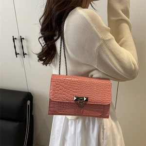 Pink crocodile pattern shoulder bag with metallic chain strap for stylish women