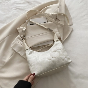 Elegant white lace crescent underarm bag with 3D butterfly decor and leather strap