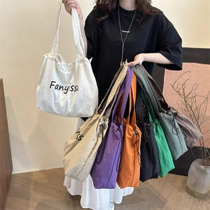 Large capacity nylon tote bags with drawstring closure in multiple colors for daily use