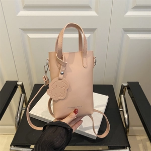 Minimalist nude PU leather small crossbody phone bag with cute dog charm for women