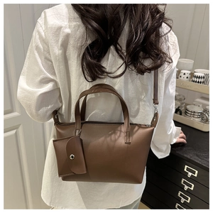 Brown faux leather bucket bag set with detachable strap and matching coin purse charm