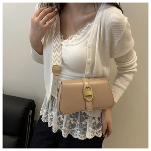 Beige small square crossbody bag featuring chic geometric woven strap and gold buckle detail
