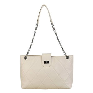Minimalist beige quilted tote bag with chain strap and metal turn-lock closure