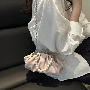 Pink pleated cloud bag with large pearl handle and silver chain strap for women