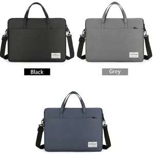 Three minimalist business laptop bags in black, grey, and blue with adjustable shoulder straps
