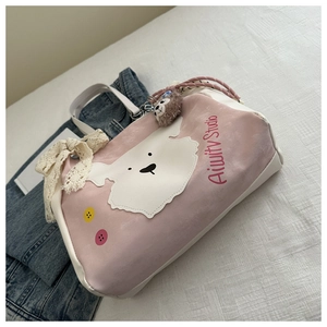 Detail der pink-weißen Canvas-Einkaufstasche mit süßem Tiermotiv und Spitzen-Schleifen-Dekor