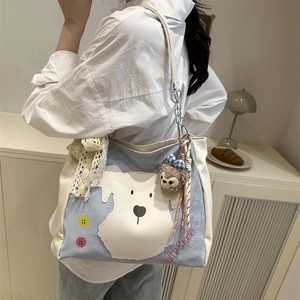 Tragetasche aus Canvas in Blau und Beige mit Welpen-Patch und Plüsch-Deko für Damen