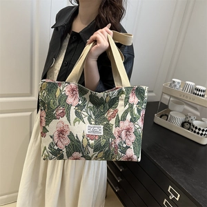 Floral jacquard tote bag with hibiscus patterns and wide shoulder straps for women
