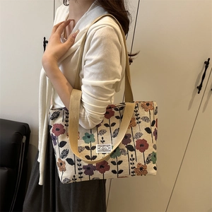 Ethnic floral jacquard tote bag for women with beige woven fabric and khaki straps