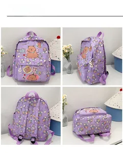 Four-sided view of purple cartoon bear schoolbag with adjustable straps and front pocket