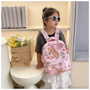 Pink cartoon bear backpack for students featuring front zipper pocket and durable canvas