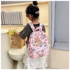 Pink student backpack with cute cartoon bear prints and adjustable straps worn by a child