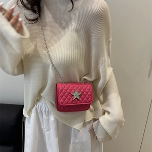 Magenta quilted crossbody bag with a rhinestone star and metal chain strap