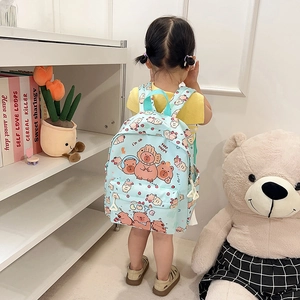 Cute light blue backpack with Capybara cartoon prints for students featuring large capacity