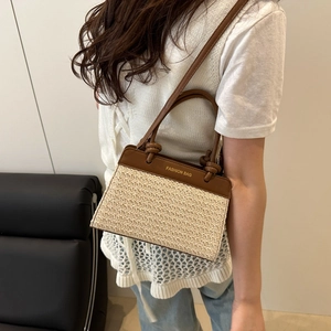 Retro woven straw tote bag with brown faux leather trim and fashion lettering