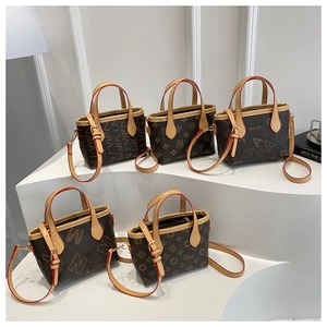 Detailed collection of mini tote bags with patterned canvas and adjustable leather straps