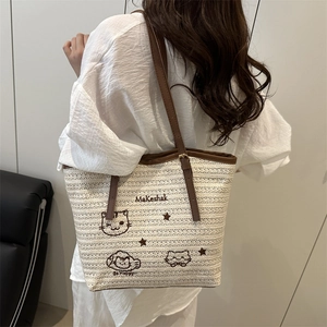 Grand sac cabas tressé avec broderie de dessin animé et lanières brunes pour l'été