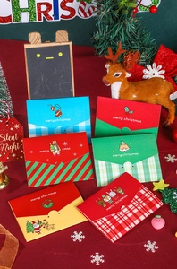 Detailed collection of festive Christmas card envelopes with cute cartoon illustrations