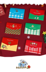 Detailed flat lay of six Christmas card sets featuring Santa and reindeer designs