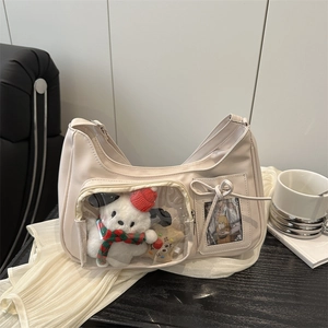 Chic beige shoulder bag with cute plush puppy in transparent pocket and bow accents