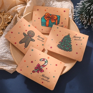 Set of vintage Christmas cards featuring reindeer, gingerbread man, and tree illustrations